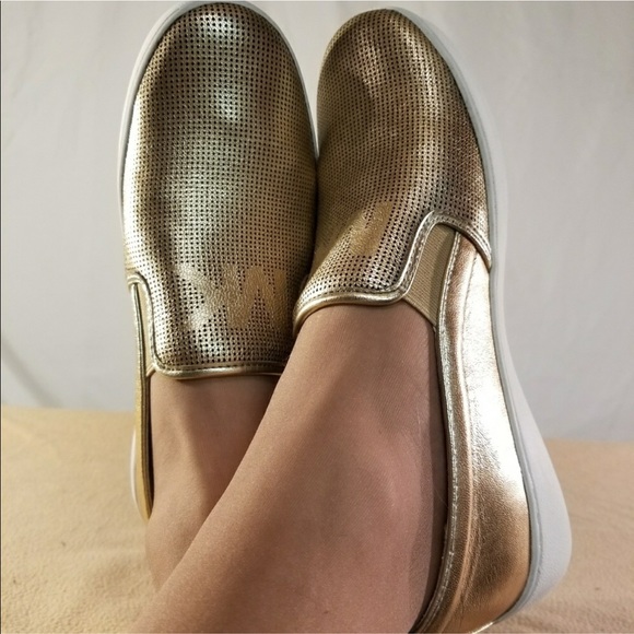 Michael Kors Shoes - Brandnew Michael Kors gold signature flats/sneakrs